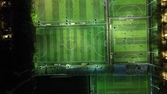 航拍足球场运动踢足球武汉江汉滩视频素材模板下载