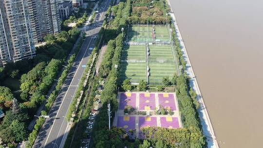 航拍足球场运动踢足球武汉江汉滩