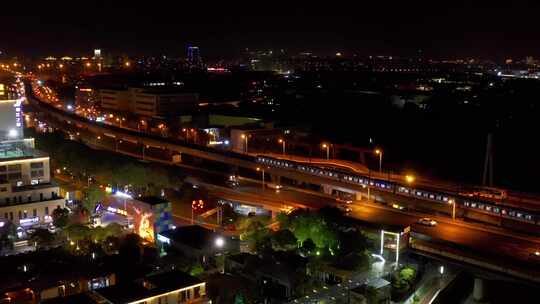 航拍上海夜晚城市轨道地铁穿行城市之中视频素材模板下载