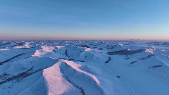 航拍雪域雪原山岭晨光