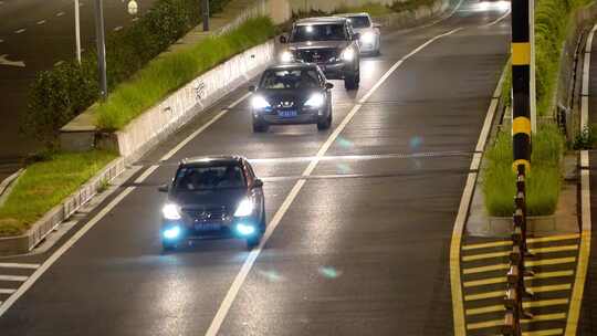 夜晚快速路隧道口车流马路行车亮化