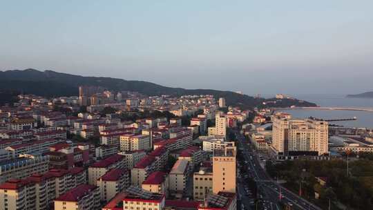 航拍山东威海沿海城市日出日落场景