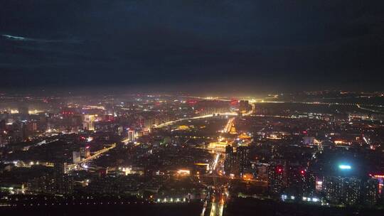 城市航拍洛阳阴雨天后城市云海夜景建筑