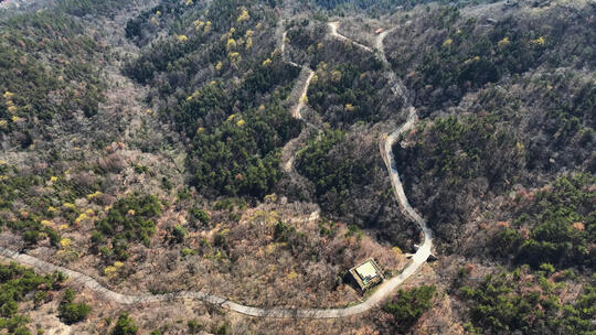 航拍山谷蜿蜒的盘山公路交通道路