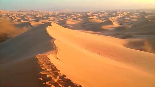 沙漠沙丘日出余晖航拍荒漠化戈壁ai素材原视频素材模板下载