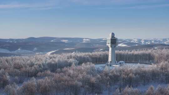 航拍冬季大雪后内蒙古阿尔山气象雷达气象站