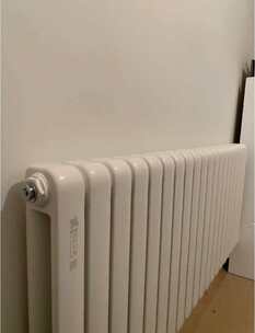 手敲打暖气片 手敲打暖气片