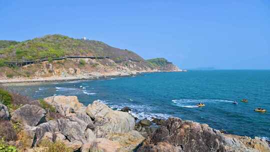 海南早晨海岛日出大海海浪拍打礁石