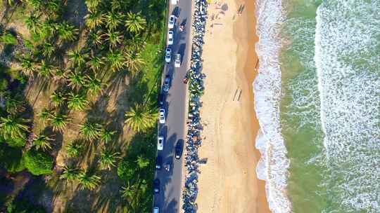 海南省万宁市日月湾大海沙滩椰树冲浪