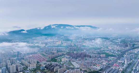 九江市低空云雾下的城市及庐山剪影航拍延时