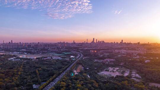 航拍广州城市公路繁忙车流夕阳晚霞延时风光