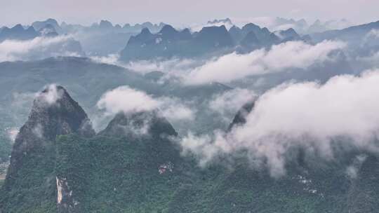 航拍桂林云海下的山峰