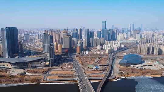 中国辽宁沈阳盛京剧院和浑河沿岸建筑航拍视频素材模板下载