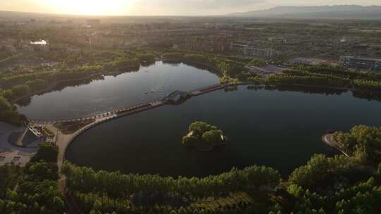 新疆伊犁巩留县蝶湖公园景区航拍城市风光