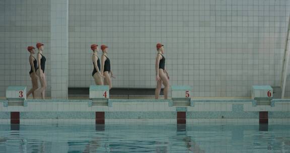 女子运动员在泳池边训练