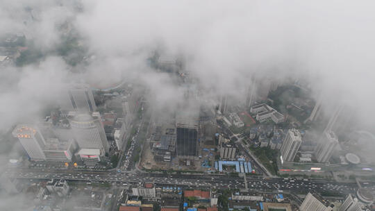 高空航拍云海中俯瞰城市建筑