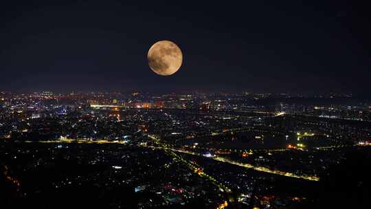 中秋节夜晚城市月亮升起延时城市夜景风光视频素材模板下载