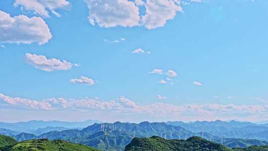 夏季蓝天白云绿色大山山顶全景风光