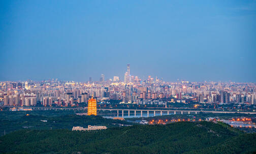 北京永定塔亮灯城市风光日转夜