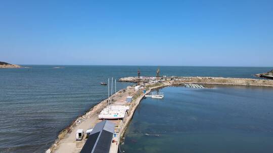 航拍威海金海滩海水浴场智明水产养殖码头