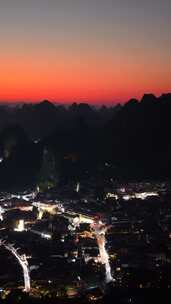 竖版航拍阳朔县城晚霞夜景