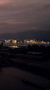 江西九江城市夜幕来临玩下夕阳竖屏航拍