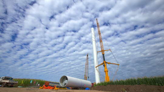 蓝天白云下风机建设 风机安装吊装视频素材模板下载