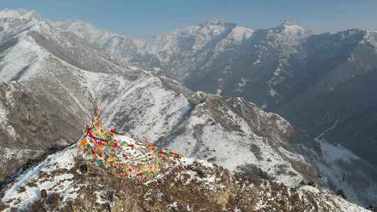 青海互助龙王山雪山天空航拍视频