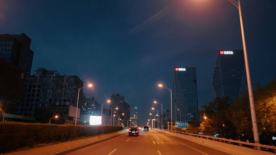 北京国贸三环夜景 汽车行驶在三环国贸视频素材模板下载