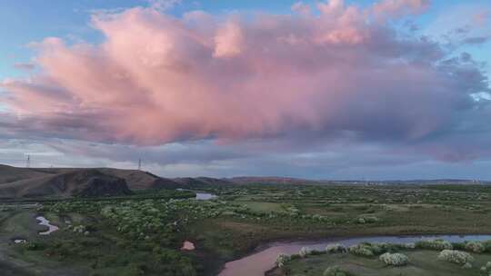 航拍初夏湿地河流晚霞彩云风景