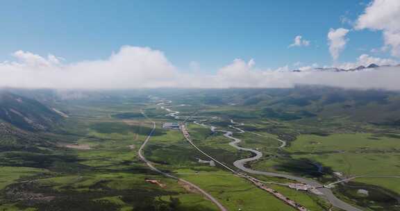 川西雪山下的草原河流大气航拍视频