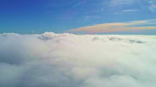 航拍高空风景云层之上云层翻滚视频素材模板下载