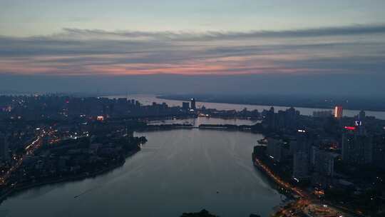 晚霞中的江西九江城市夜景航拍