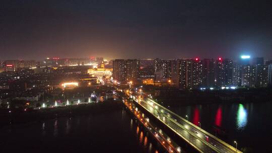 城市航拍洛阳阴雨天后城市云海夜景建筑