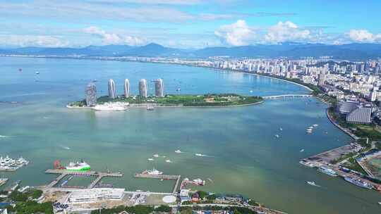 海南三亚城市蓝天白云建筑凤凰岛全景海岸线