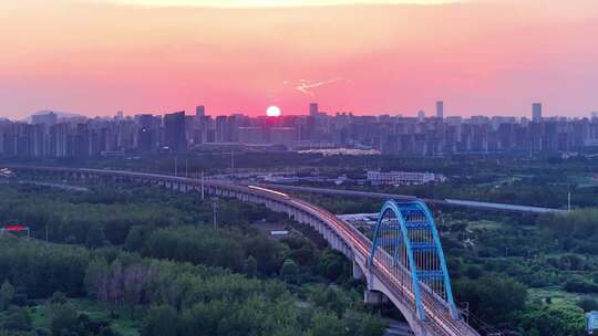 航拍高铁动车逆光前行开场片头