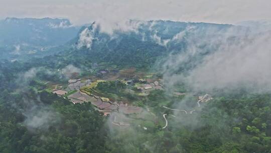 航拍山巅世外桃源土家族古寨梯田视频素材模板下载