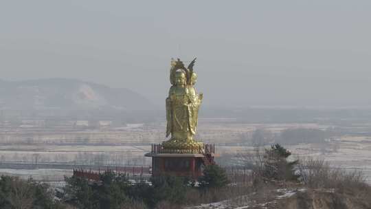 牡丹江报恩寺金色佛像雕塑航拍