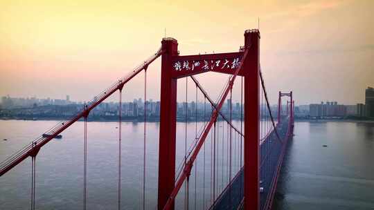 航拍朝阳下的武汉鹦鹉洲长江大桥