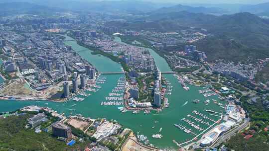 海南三亚航拍蓝天白云三亚湾城市凤凰岛海洋