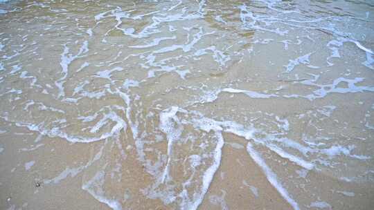 海南三亚海边沙滩海浪特写