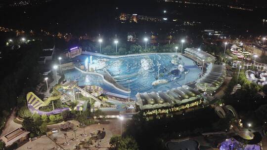 鸟瞰航拍上海松江玛雅水上乐园游泳池夜景