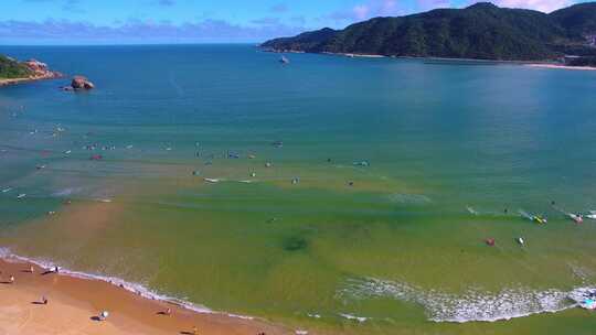 航拍三亚后海皇后湾冲浪及海棠湾海岛海浪