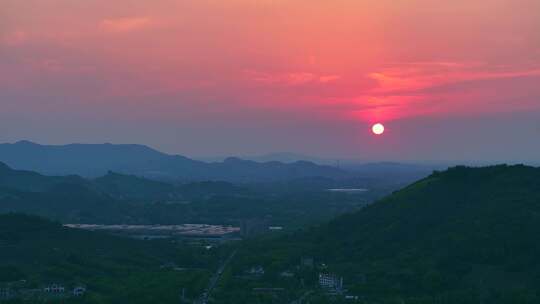 航拍山区城市落日晚霞群山起伏