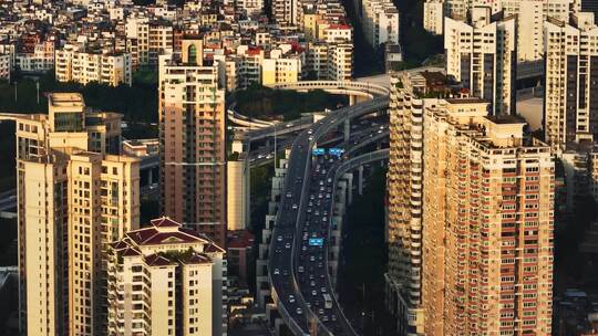 长焦航拍夕阳下繁忙的广州交通以及城市