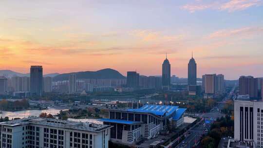 航拍枣庄新城市政驻地初冬的朝霞