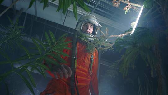 宇航员在温室培育树叶