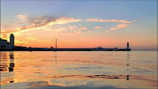 沿海城市海上日出朝霞延时