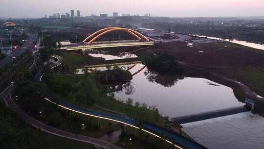 航拍湖南衡阳陆家新区城市夜景人行观光桥