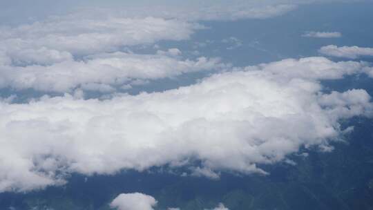 飞机上看窗外山川白云云绕峰顶视频素材模板下载